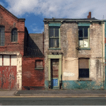 Image showing a row of run down houses