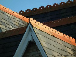 A close up of a victorian gothic roof