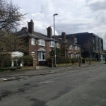 Red brick houses on a council estate.