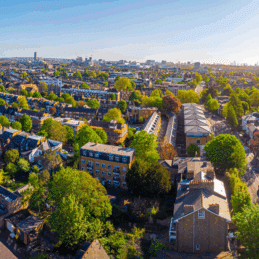 An aerial shot of a city with residential houses