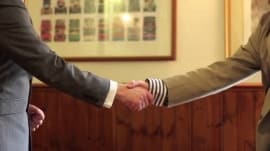 handshake negotiating the price of a house purchase