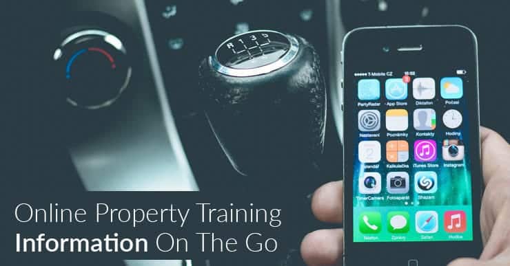 A picture of a gear stick in a car and a hand holding a mobile phone. Text says, 'online property training, on the go'.