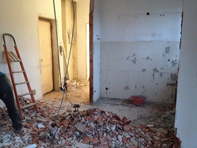 run down house with back to brick renovation